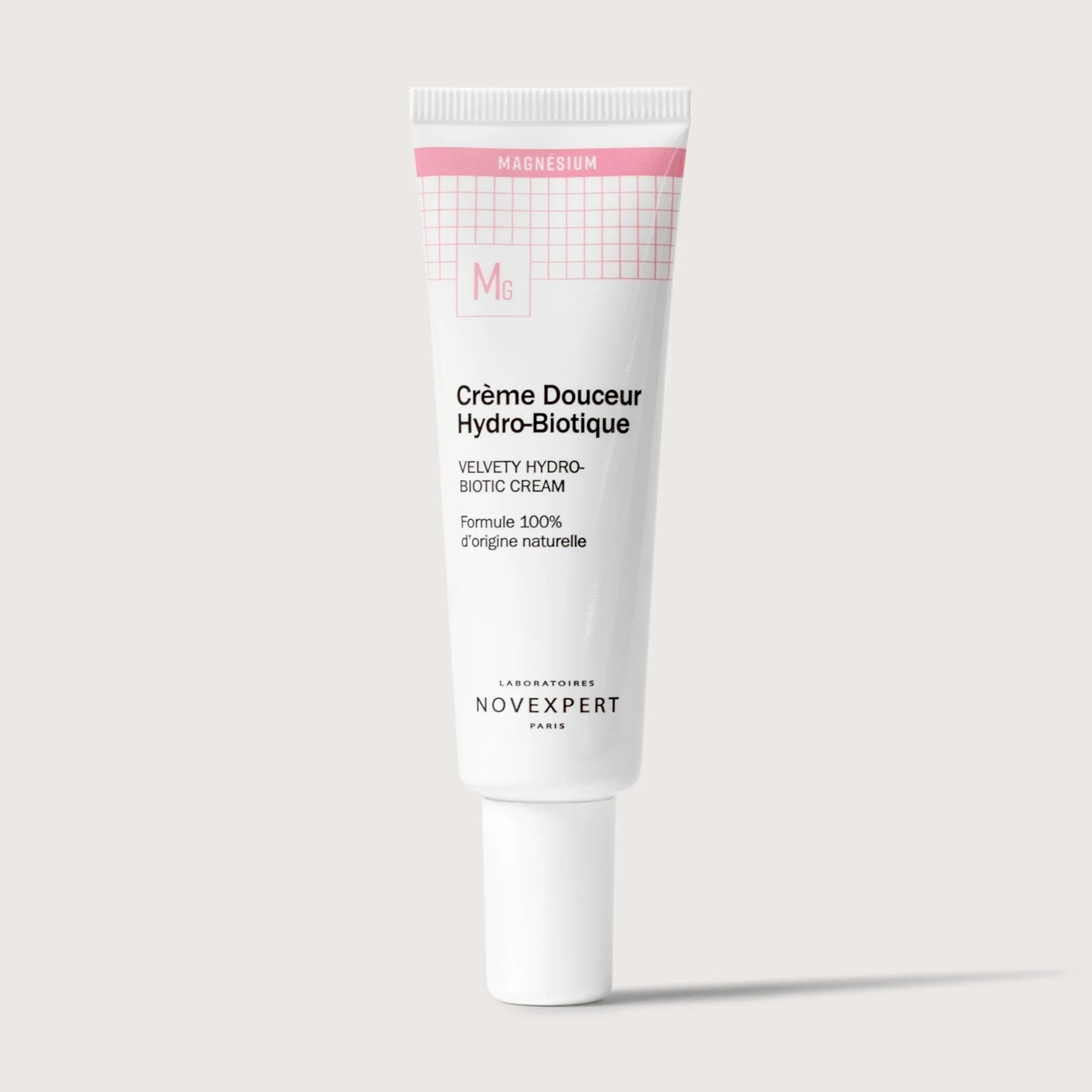 Skincare tube labeled 'Cèrème Douceur Hydro-Biotique' by Novexpert on a light gray background