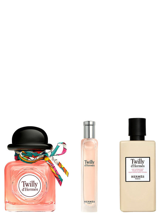 Three Hermes Twilly d'Hermes perfume bottles on a white background
