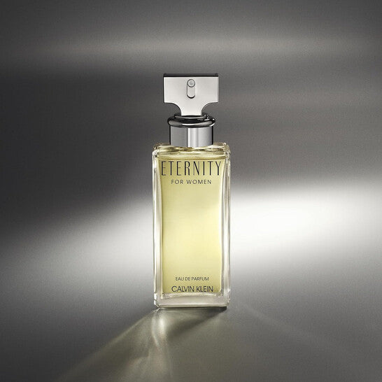 Calvin Klein Eternity for Women perfume bottle on a gray background