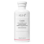 A bottle of KEUNE CARE Color Brillianz Conditioner with white and pink labeling, indicating that it is a hair care product for color-treated hair.