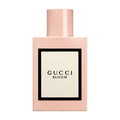 Gucci Bloom perfume bottle on a white background