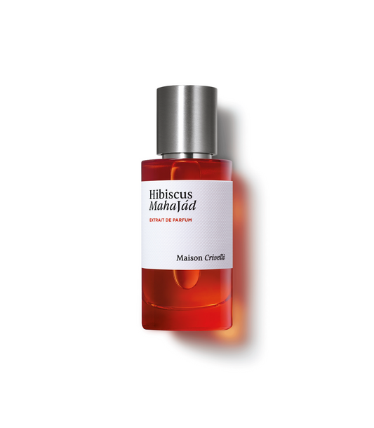 Perfume bottle labeled 'Hibiscus Mahajad' by Maison Crisell on a white background