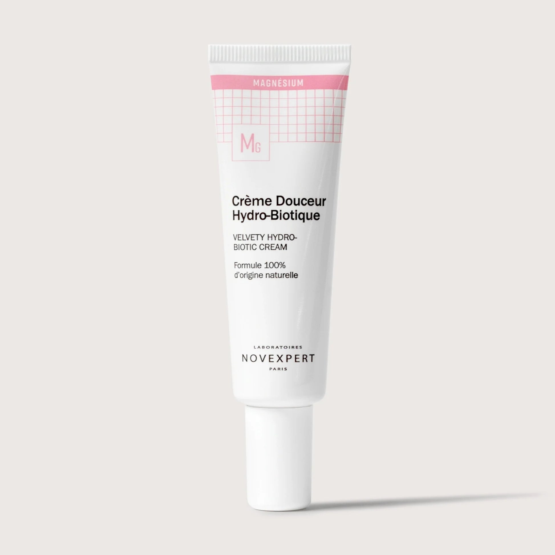 Skincare tube labeled 'Cèrème Douceur Hydro-Biotique' by Novexpert on a light gray background