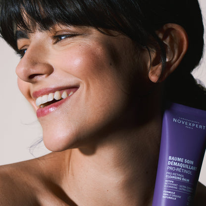 Woman holding a purple skincare product with 'NOVEFFECT' branding.
