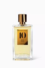 A rectangular glass perfume bottle filled with pale golden liquid, featuring a metallic gold label with the number 10 and the text 'ROSENDO MATEU' and 'MUSK', topped with a shiny gold cap, on a clean white background.