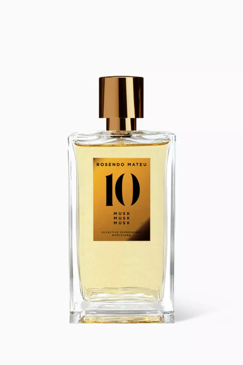 A rectangular glass perfume bottle filled with pale golden liquid, featuring a metallic gold label with the number 10 and the text 'ROSENDO MATEU' and 'MUSK', topped with a shiny gold cap, on a clean white background.