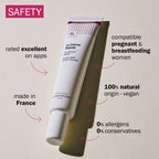 Tube of La Crème Repliqé with safety features highlighted on a beige background