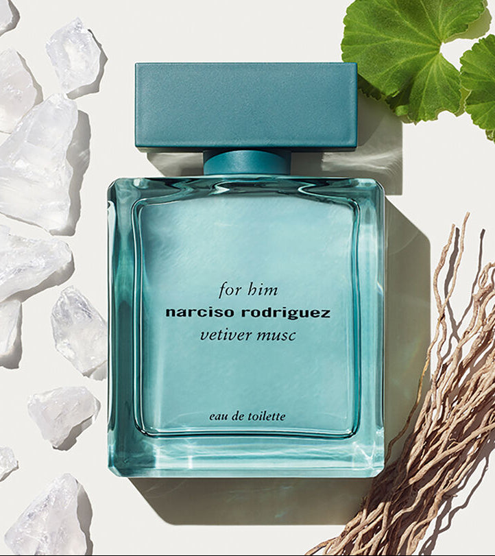 Narciso Rodriguez perfume bottle with decorative elements on a light background