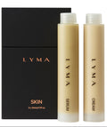 LYMA skincare set with serum and cream bottles on a black box background