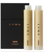 LYMA skincare set with serum and cream bottles on a black box background