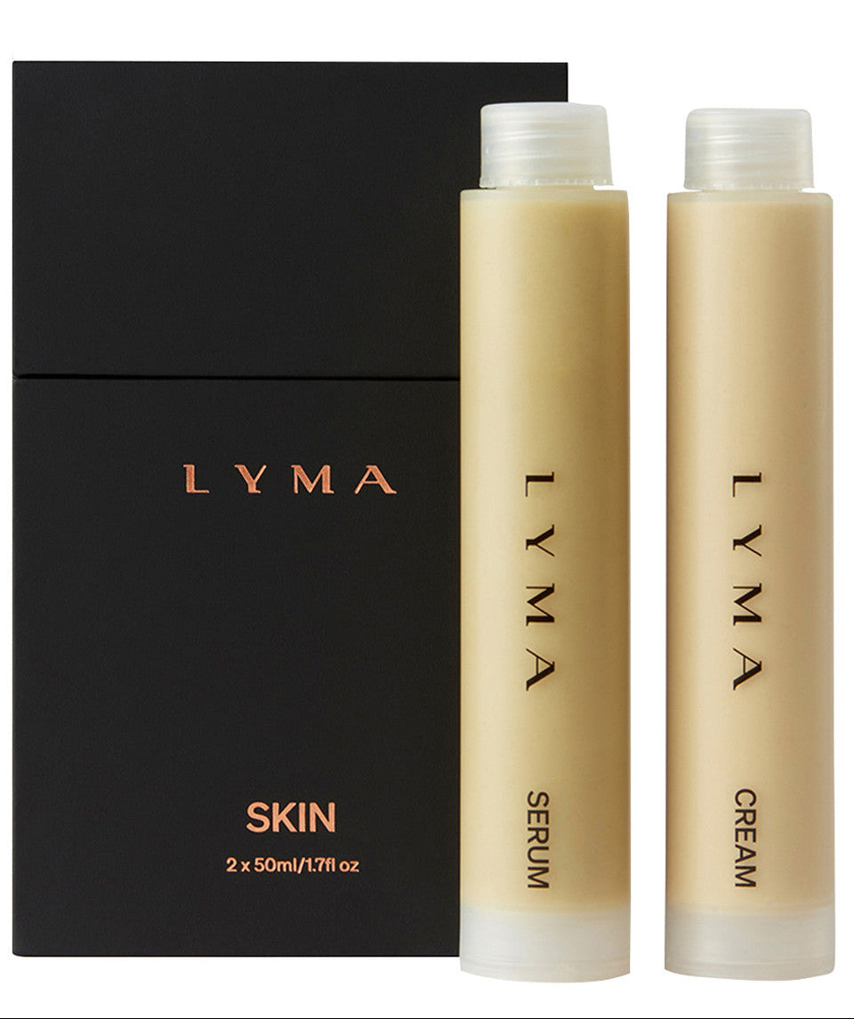 LYMA skincare set with serum and cream bottles on a black box background