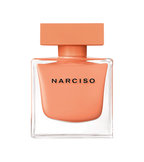 Narciso perfume bottle with a peach-colored cap and body on a white background